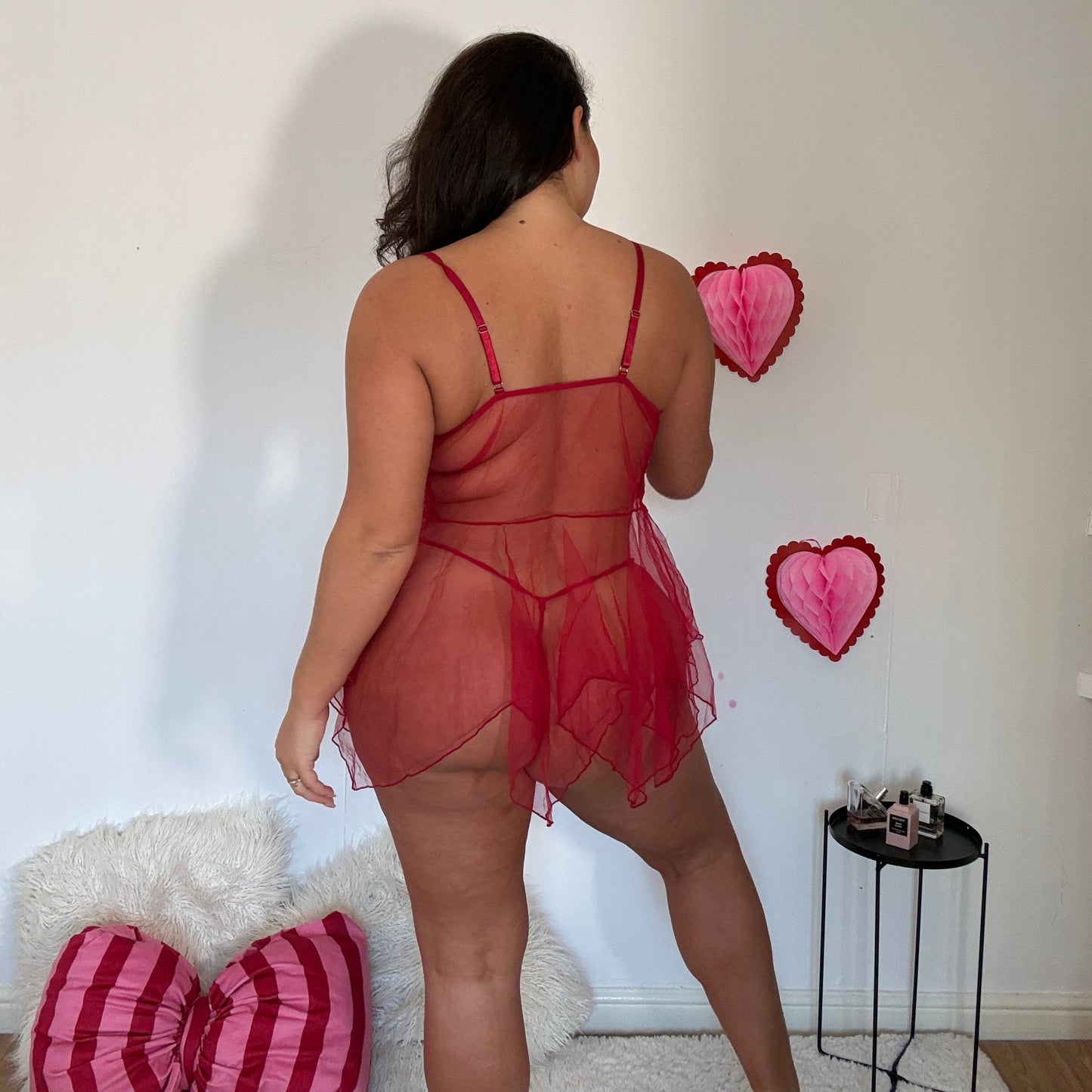 plus size woman from behind wearing sheer lingerie
